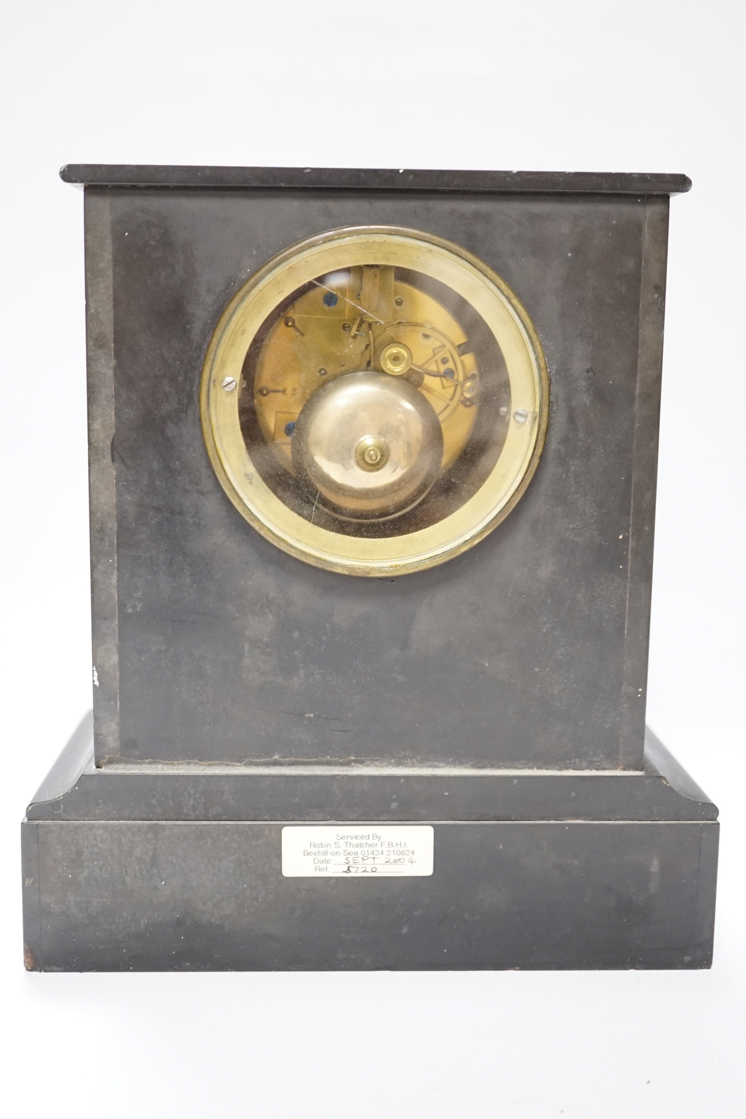 A black slate and marble mantle clock, 6.5cm high